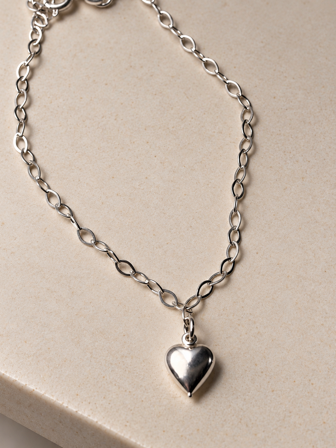 Pulseira Ping. Coração em prata 925